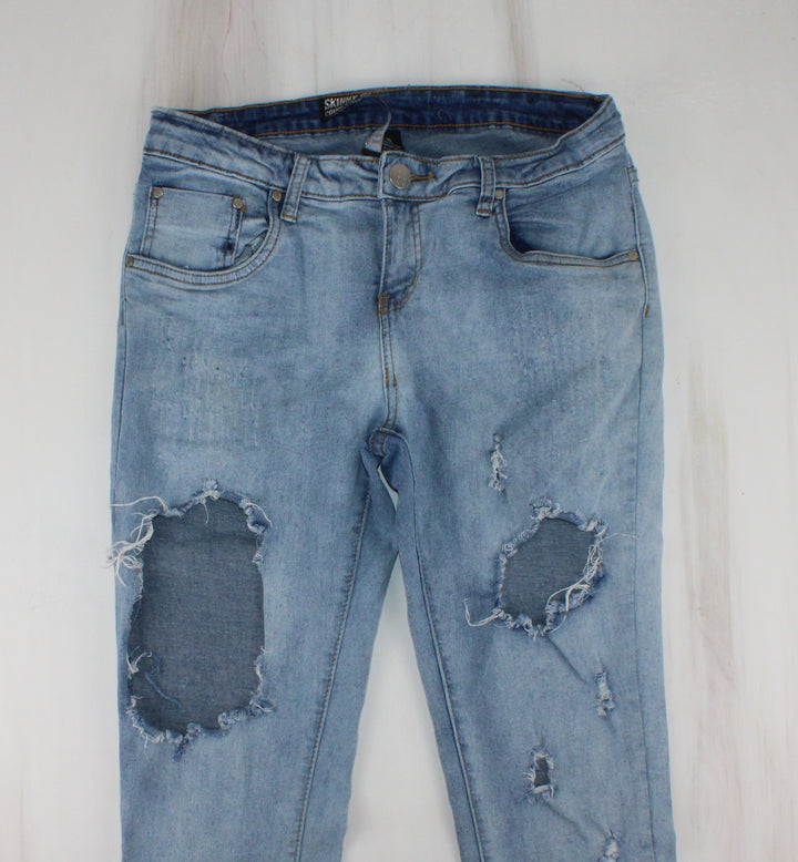 LOW RISE SKINNY FIT DISTRESSED JEANS LADIES SIZE 11 PRE-LOVED