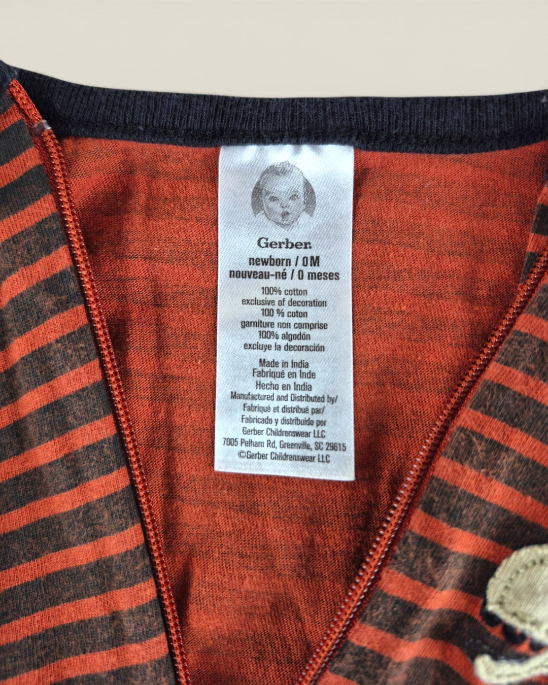 Pre-Loved Gerber Striped Dinosaur Footies NB | Betty’s Marketplace