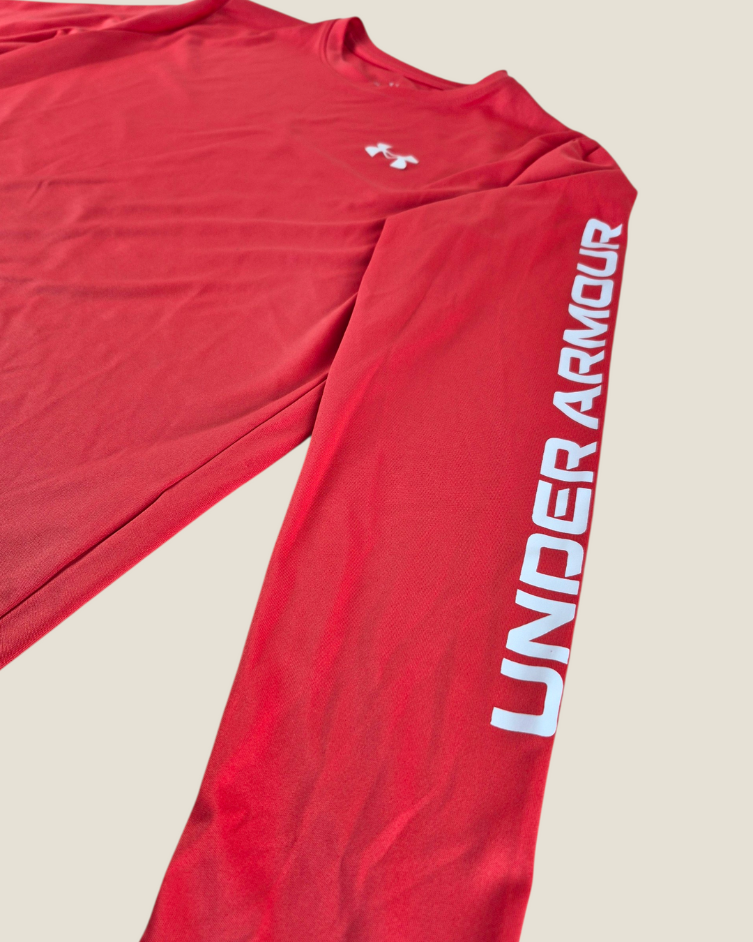 Pre-Loved Under Armour Coral Athletic Top Youth XL | Betty’s Marketplace