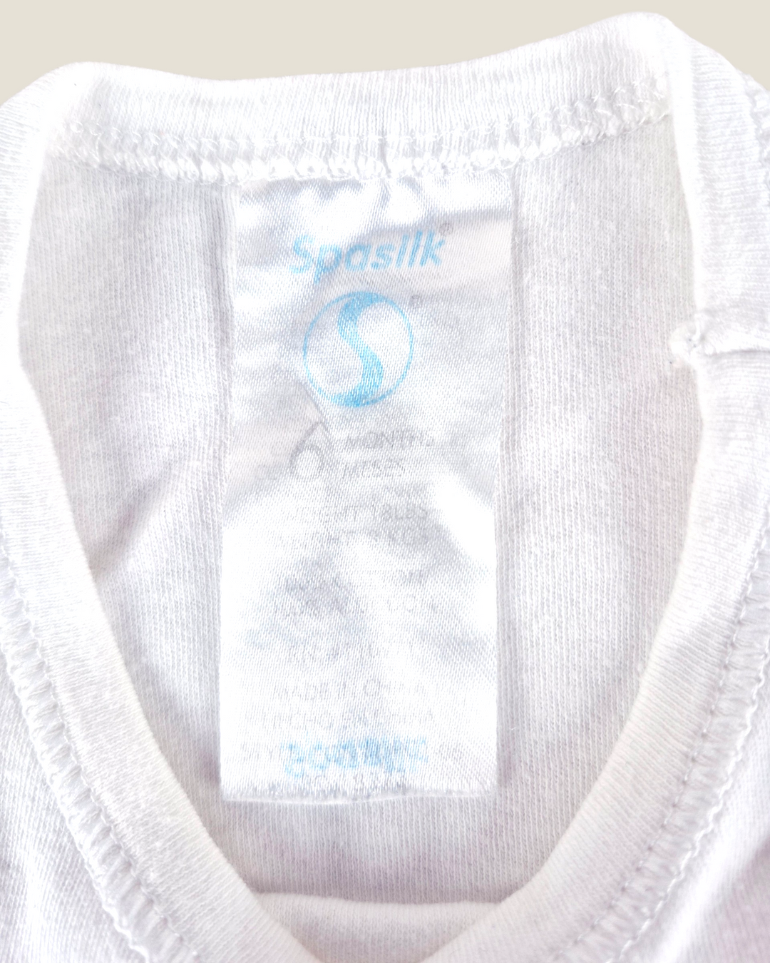 Pre-Loved Spasilk White Sleeveless Onesie 6M | Betty’s Marketplace