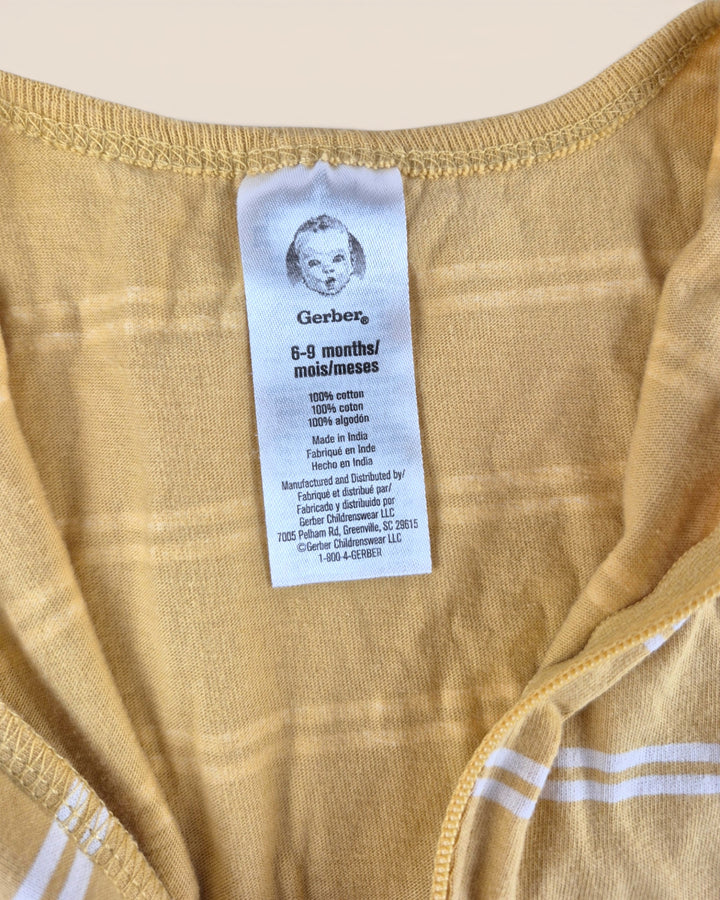 Pre-Loved Gerber Yellow Striped Footies 6-9M | Betty’s Marketplace