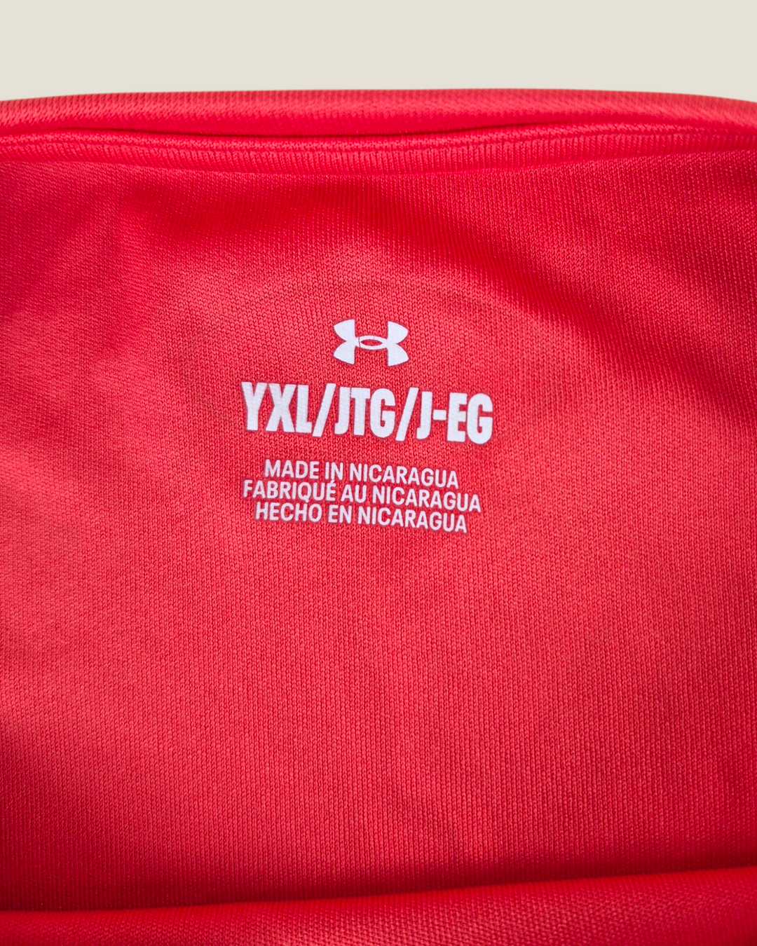 Pre-Loved Under Armour Coral Athletic Top Youth XL | Betty’s Marketplace