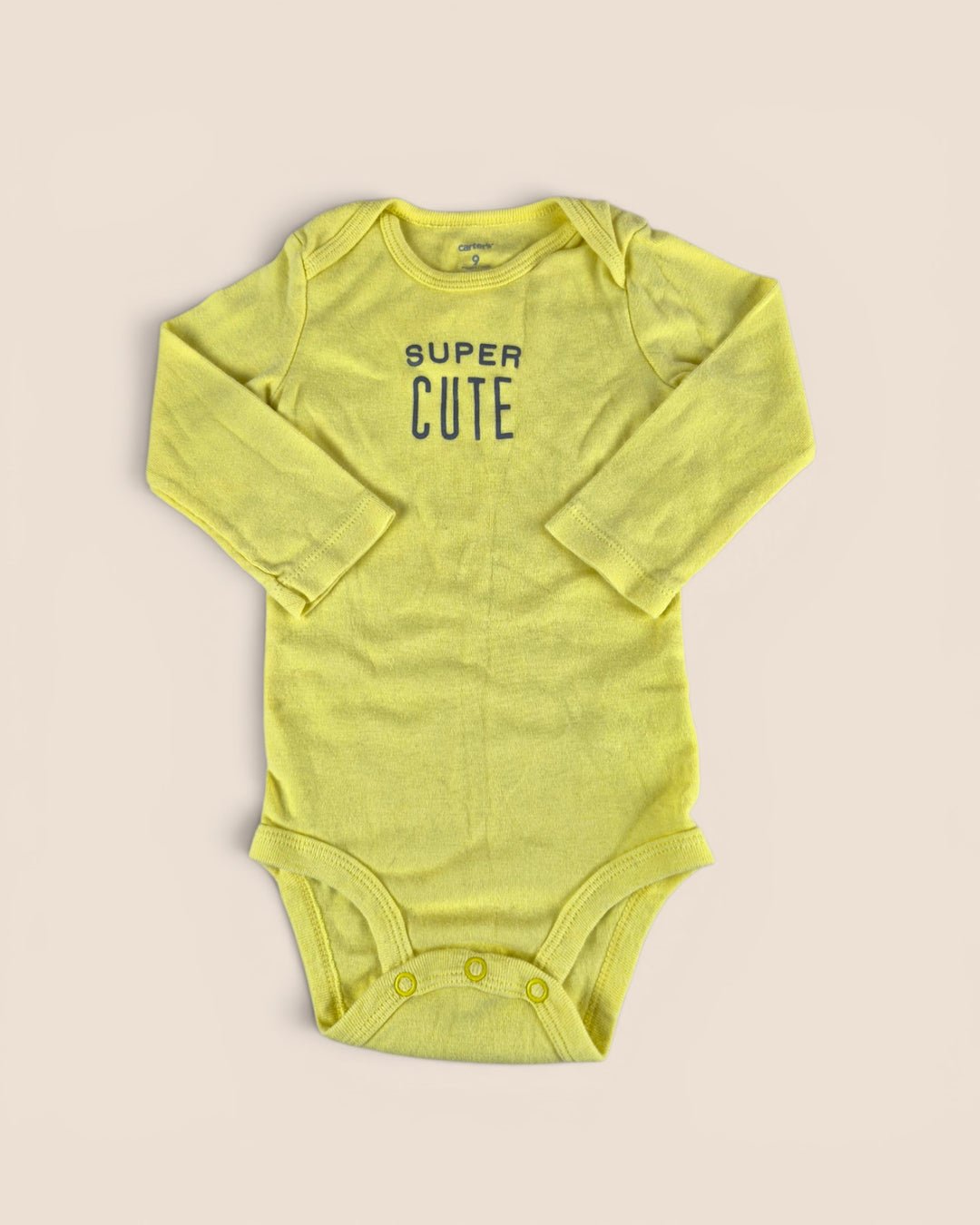 Pre-Loved Carter's Yellow "Super Cute" Onesie 9M | Betty’s Marketplace