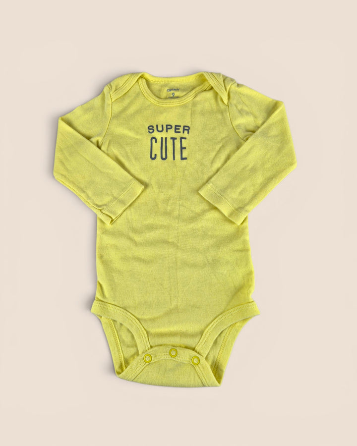Pre-Loved Carter's Yellow "Super Cute" Onesie 9M | Betty’s Marketplace