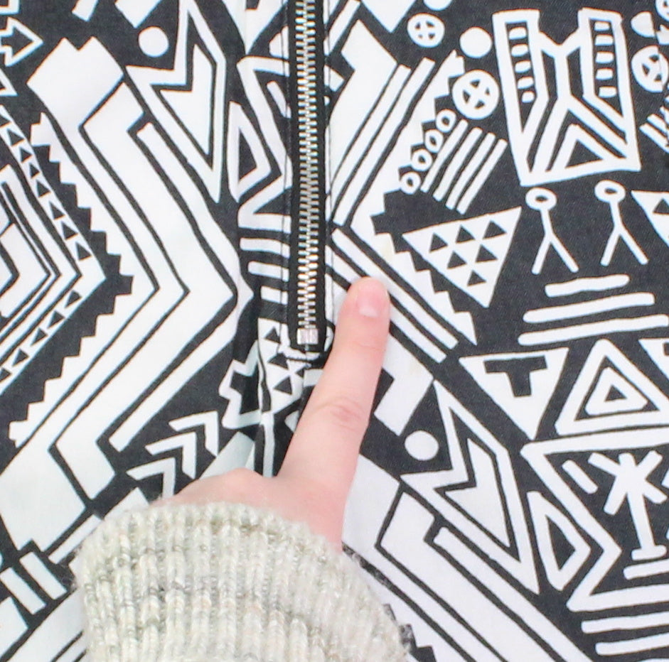 DIVIDED BLACK AND WHITE PATTERNED PANTS SIZE 10 PRE-LOVED